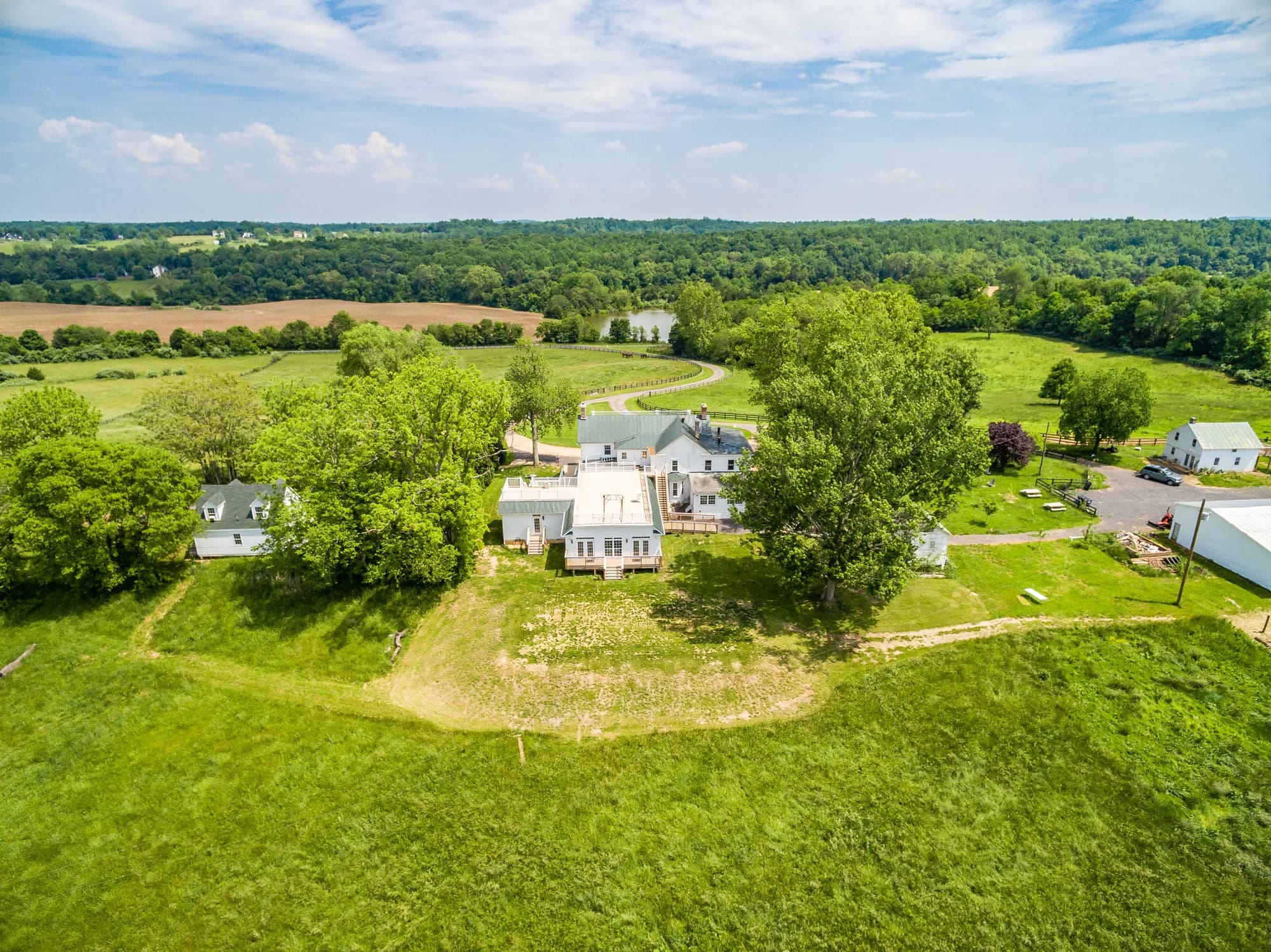 Aerial view of Rixey Manor historic estate surrounded by lush Virginia countryside and rolling green hills